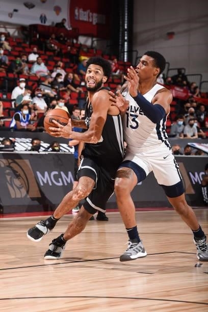 Nate Renfro of the San Antonio Spurs drives to the basket against the Minnesota Timberwolves during the 2021 Las Vegas Summer League on August 9,...