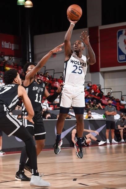 McKinley Wright IV of the Minnesota Timberwolves drives to the basket against the San Antonio Spurs during the 2021 Las Vegas Summer League on August...