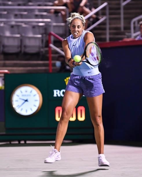 Madison Keys of the United States hits a return during her Womens Singles first round match against Rebecca Marino of Canada on Day One of the...