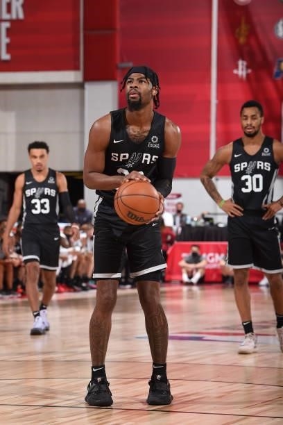 Cameron Reynolds of the San Antonio Spurs shoots a three point basket against the Minnesota Timberwolves during the 2021 Las Vegas Summer League on...