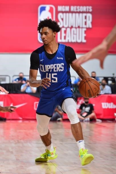 Keon Johnson of the LA Clippers dribbles the ball against the Milwaukee Bucks during the 2021 Las Vegas Summer League on August 9, 2021 at the Cox...
