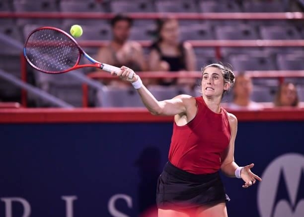 Rebecca Marino of Canada hits a return during her Womens Singles first round match against Madison Keys of the United States on Day One of the...