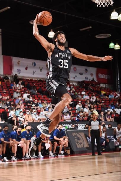 Nate Renfro of the San Antonio Spurs drives to the basket against the Minnesota Timberwolves during the 2021 Las Vegas Summer League on August 9,...