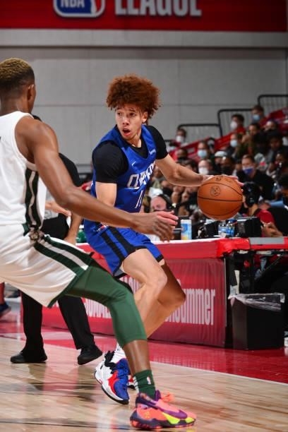 Jason Preston of the LA Clippers dribbles the ball against the Milwaukee Bucks during the 2021 Las Vegas Summer League on August 9, 2021 at the Cox...