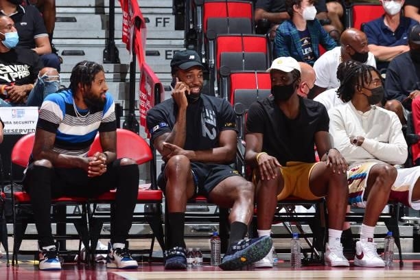 Paul George, Kawhi Leonard, Reggie Jackson, and Terance Mann of the LA Clippers look on during the 2021 Las Vegas Summer League on August 9, 2021 at...