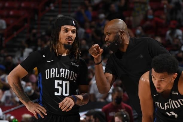 Cole Anthony and Head Coach, Jamahl Mosley of the Orlando Magic talk during the game against the Golden State Warriors during the 2021 Las Vegas...
