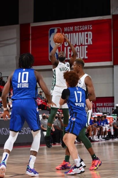 Theo Pinson of the Milwaukee Bucks shoots a three point basket against the LA Clippers during the 2021 Las Vegas Summer League on August 9, 2021 at...