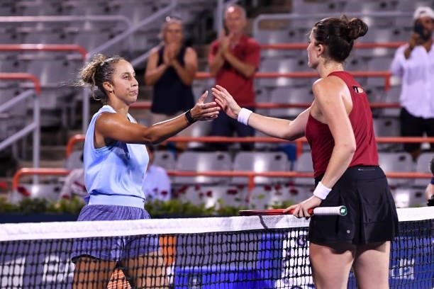 Madison Keys of the United States shakes hands with her opponent Rebecca Marino of Canada after losing in straight sets 6-3, 6-3 during her Womens...