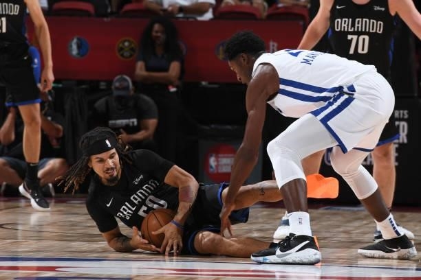 Cole Anthony of the Orlando Magic grabs the ball against the Golden State Warriors during the 2021 Las Vegas Summer League on August 9, 2021 at the...