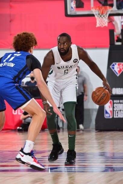 Theo Pinson of the Milwaukee Bucks dribbles the ball against the Milwaukee Bucks during the 2021 Las Vegas Summer League on August 9, 2021 at the Cox...