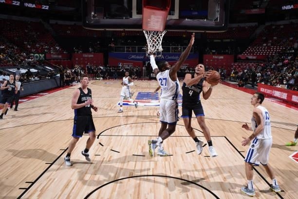 Jalen Suggs of the Orlando Magic drives to the basket against the Golden State Warriors during the 2021 Las Vegas Summer League on August 9, 2021 at...
