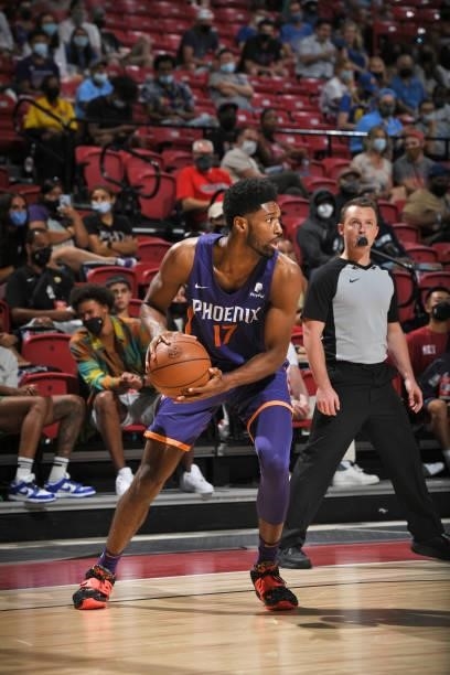 Kyle Alexander of the Phoenix Suns dribbles during the game against the Utah Jazz during the 2021 Las Vegas Summer League on August 9, 2021 at the...