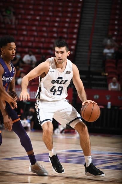 Dakota Mathias of the Utah Jazz White dribbles during the game against the Phoenix Suns during the 2021 Las Vegas Summer League on August 9, 2021 at...