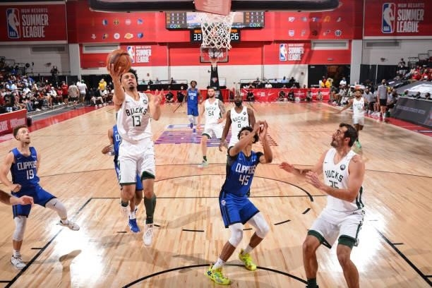 Jordan Nwora of the Milwaukee Bucks drives to the basket against the LA Clippers during the 2021 Las Vegas Summer League on August 9, 2021 at the Cox...