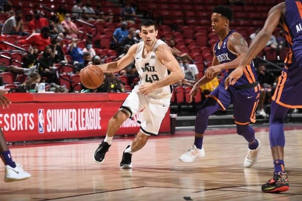 Dakota Mathias of the Utah Jazz White drives to the basket during the game against the Phoenix Suns during the 2021 Las Vegas Summer League on August...