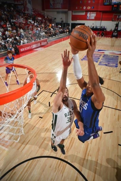 Isaiah Hicks of the LA Clippers dunks the ball against the Milwaukee Bucks during the 2021 Las Vegas Summer League on August 9, 2021 at the Cox...