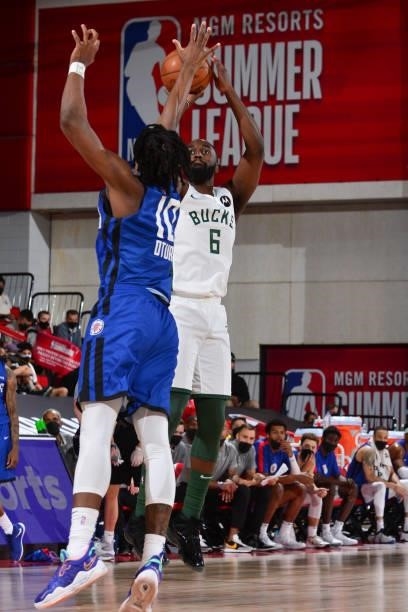 Theo Pinson of the Milwaukee Bucks shoots a three point basket against the LA Clippers during the 2021 Las Vegas Summer League on August 9, 2021 at...