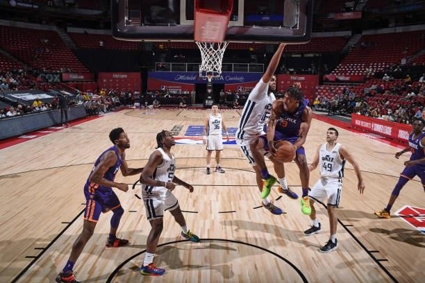 Justin Simon of the Phoenix Suns drives to the basket during the game against the Utah Jazz during the 2021 Las Vegas Summer League on August 9, 2021...