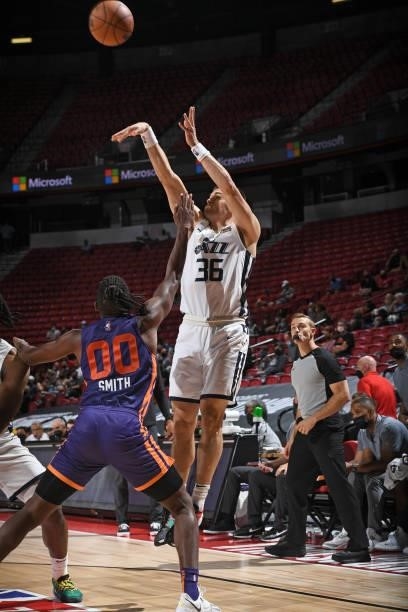 Matt Mooney of the Utah Jazz White drives to the basket during the game against the Phoenix Suns during the 2021 Las Vegas Summer League on August 9,...