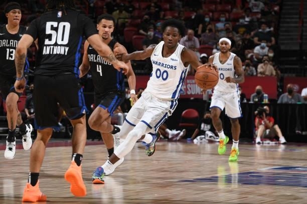 Jonathan Kuminga of the Golden State Warriors handles the ball against the Orlando Magic during the 2021 Las Vegas Summer League on August 9, 2021 at...