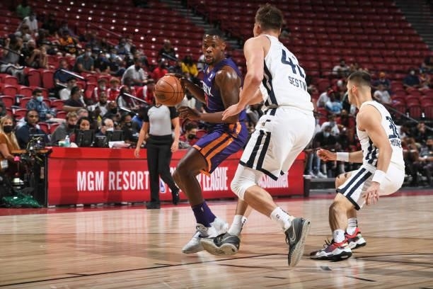 Michael Frazier II of the Phoenix Suns drives to the basket during the game against the Utah Jazz during the 2021 Las Vegas Summer League on August...