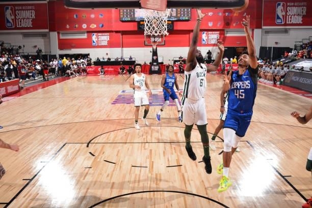 Keon Johnson of the LA Clippers of the LA Clippers drives to the basket against the Milwaukee Bucks during the 2021 Las Vegas Summer League on August...