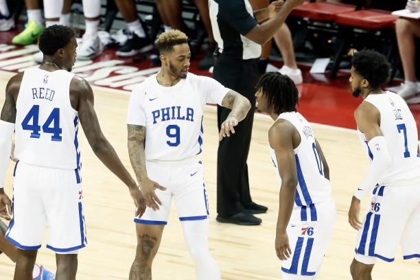 Rayjon Tucker of the Philadelphia 76ers high fives teammates during the game against the Dallas Mavericks during a Summer League game at the Thomas &...