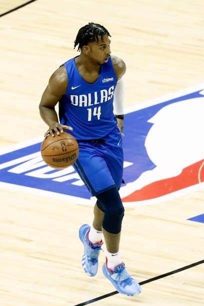 Nate Hinton of the Dallas Mavericks dribbles during the game against the Philadelphia 76ers during a Summer League game at the Thomas & Mack Center...