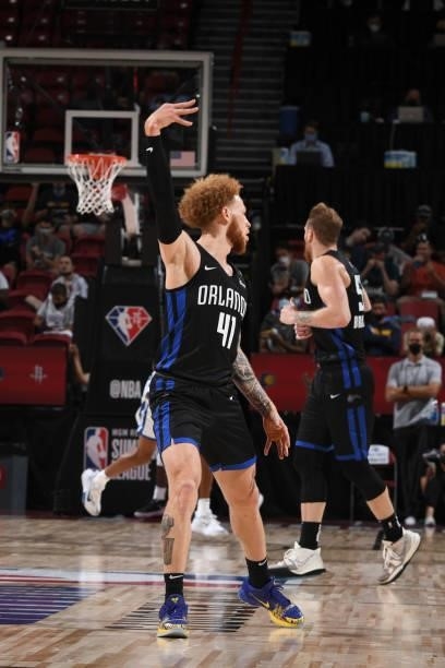 Hassani Gravett of the Orlando Magic reacts to a play during the game against the Golden State Warriors during the 2021 Las Vegas Summer League on...