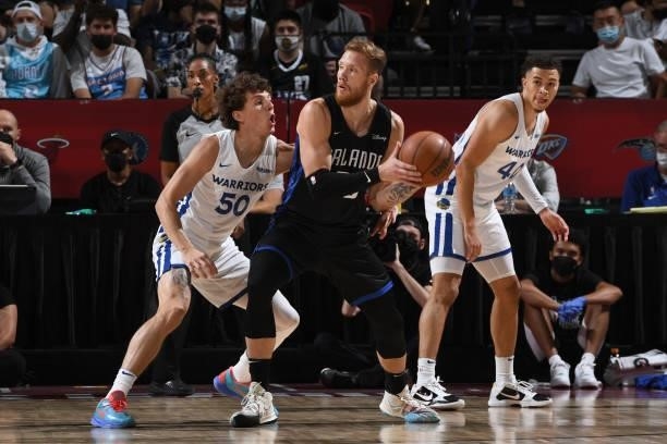 Ignas Brazdeikis of the Orlando Magic looks to pass the ball against the Golden State Warriors during the 2021 Las Vegas Summer League on August 9,...