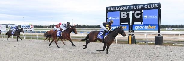 Catadude ridden by Celine Gaudray wins the Hygain Winners Choice BM58 Handicap at Sportsbet-Ballarat Synthetic Racecourse on August 10, 2021 in...