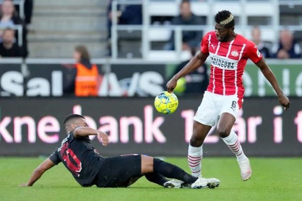 Evander of FC Midtjylland, Ibrahim Sangare of PSV during the UEFA Champions League match between FC Midtjylland v PSV at the Arena Herning on August...