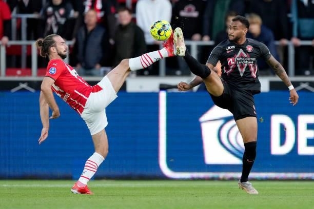 Davy Propper of PSV, Junior Brumado of FC Midtjylland during the UEFA Champions League match between FC Midtjylland v PSV at the Arena Herning on...