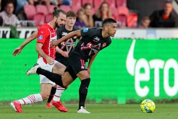 Davy Propper of PSV, Evander of FC Midtjylland during the UEFA Champions League match between FC Midtjylland v PSV at the Arena Herning on August 10,...