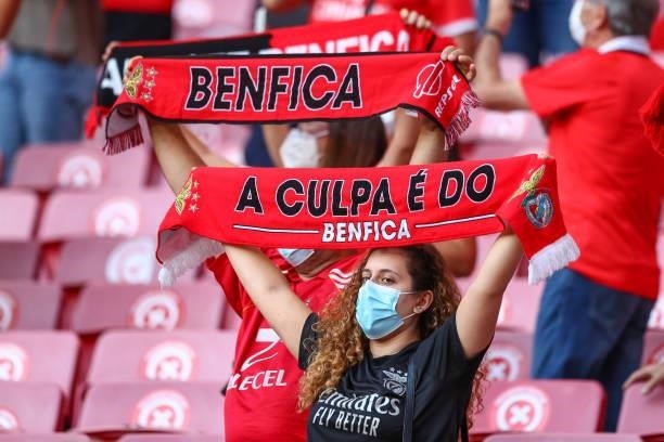 Benfica supporters return to the stands during the UEFA Champions League Third Qualifying Round Leg One match between SL Benfica and Spartak Moskva...