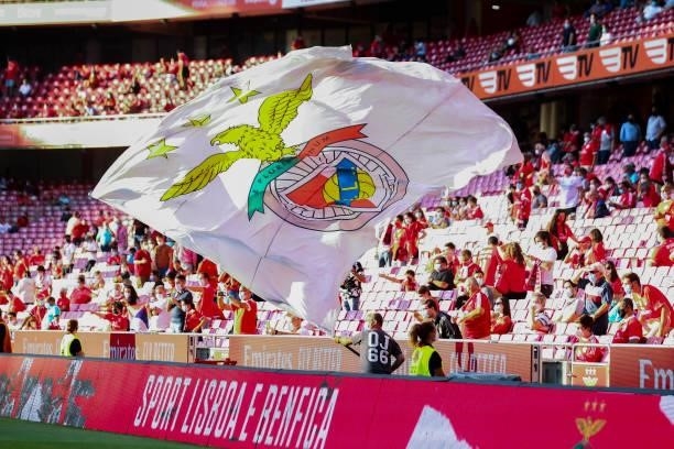 Benfica supporters return to the stands during the UEFA Champions League Third Qualifying Round Leg One match between SL Benfica and Spartak Moskva...