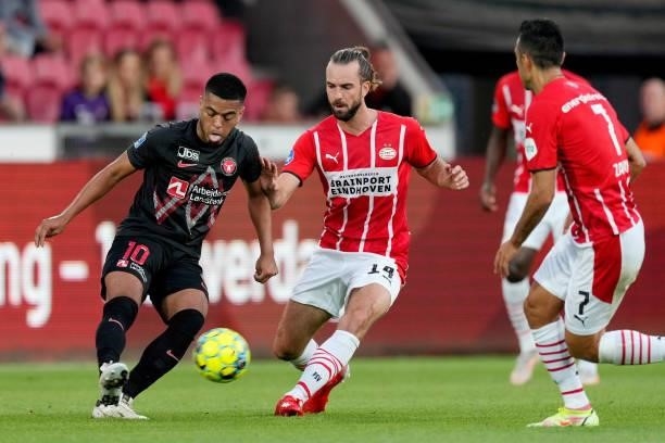 Evander of FC Midtjylland, Davy Propper of PSV during the UEFA Champions League match between FC Midtjylland v PSV at the Arena Herning on August 10,...