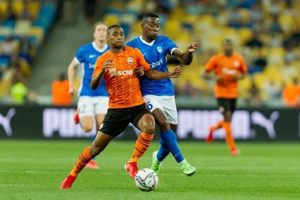Tete of Shakhtar Donetsk and Carlos Cuesta of KRC Genk battle for the ball during the UEFA Champions League 2021-22 third qualifying round 2nd leg...
