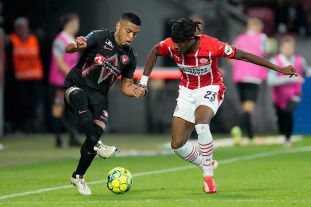 Evander of FC Midtjylland, Noni Madueke of PSV during the UEFA Champions League match between FC Midtjylland v PSV at the Arena Herning on August 10,...