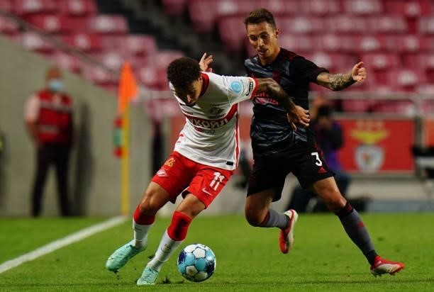 Jordan Larsson of Spartak Moskva with Alex Grimaldo of SL Benfica in action during the UEFA Champions League : Third Qualifying Round Leg Two match...