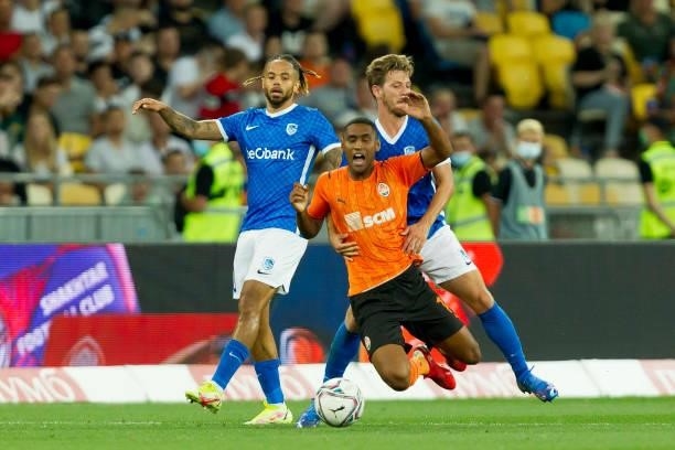 Theo Bongonda of KRC Genk, Tete of Shakhtar Donetsk and Patrik Hrosovsky of KRC Genk battle for the ball during the UEFA Champions League 2021-22...