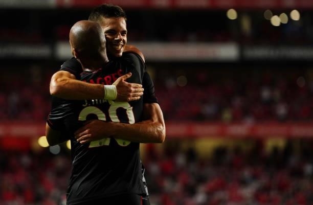 Joao Mario of SL Benfica celebrates with teammate Julian Weigl after scoring a goal during the UEFA Champions League : Third Qualifying Round Leg Two...