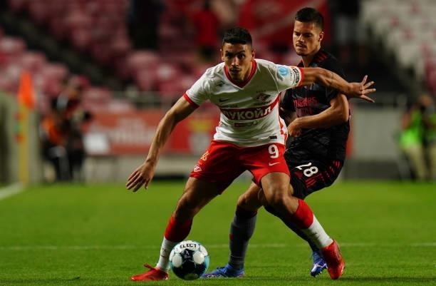 Ezequiel Ponce of Spartak Moskva with Julian Weigl of SL Benfica in action during the UEFA Champions League Third Qualifying Round Leg Two match...