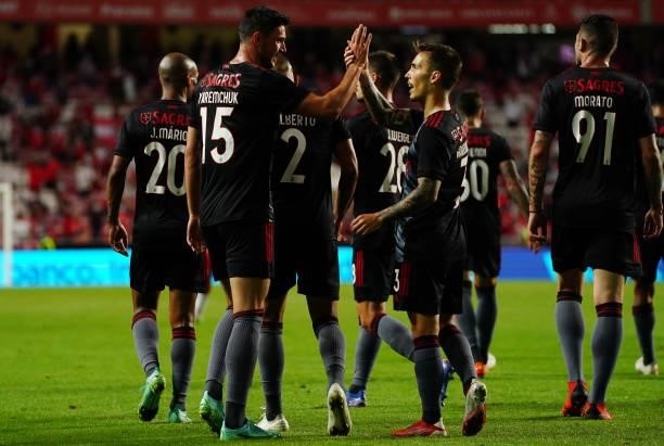 New signing Roman Yaremchuk of SL Benfica celebrates with teammate Alex Grimaldo of SL Benfica after scoring a goal in his debut during the UEFA...