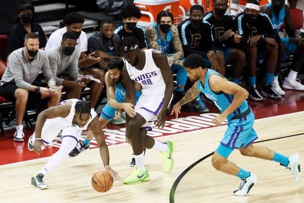 Davion Mitchell of the Sacramento Kings catches a loose ball against the Charlotte Hornets during the 2021 Las Vegas Summer League on August 9, 2021...