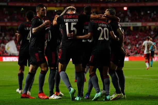 New signing Roman Yaremchuk of SL Benfica celebrates with teammates after scoring a goal in his debut during the UEFA Champions League Third...