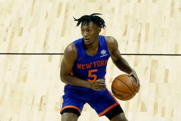 Immanuel Quickley of the New York Knicks dribbles the ball against the Indiana Pacers during the 2021 Las Vegas Summer League on August 9, 2021 at...