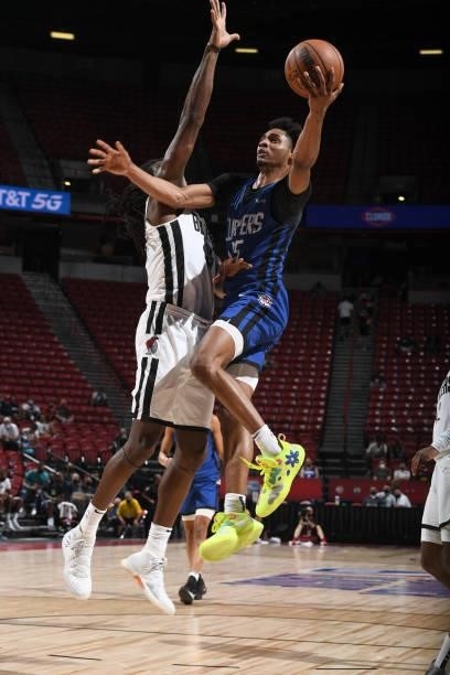 Keon Johnson of the LA Clippers drives to the basket against the Portland Trail Blazers during the 2021 Las Vegas Summer League on August 10, 2021 at...