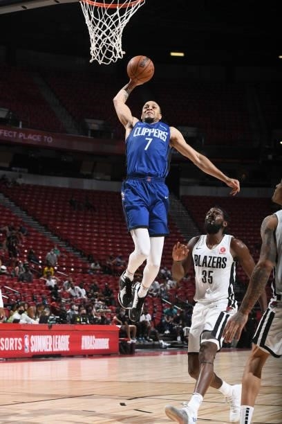 Amir Coffey of the LA Clippers drives to the basket against the Portland Trail Blazers during the 2021 Las Vegas Summer League on August 10, 2021 at...