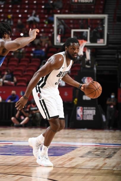 Kenneth Faried of the Portland Trail Blazers handles the ball against the LA Clippers during the 2021 Las Vegas Summer League on August 10, 2021 at...